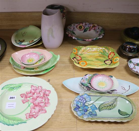 A collection of Carlton Ware flower moulded dishes and two vases, many Australian design largest diameter 29cm